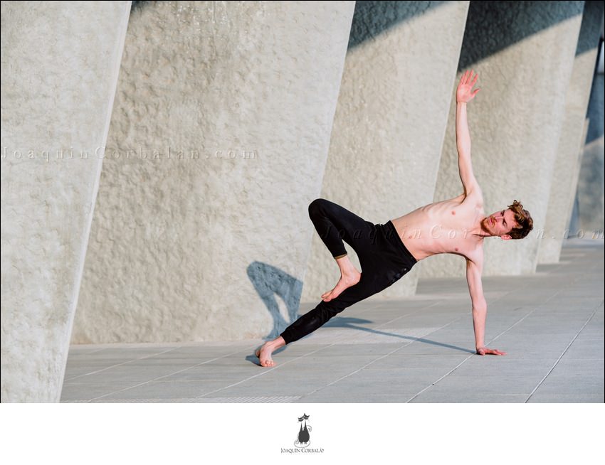 Vasisthasana On The Cement Of The City, Yoga Posture To Exercise The Core.